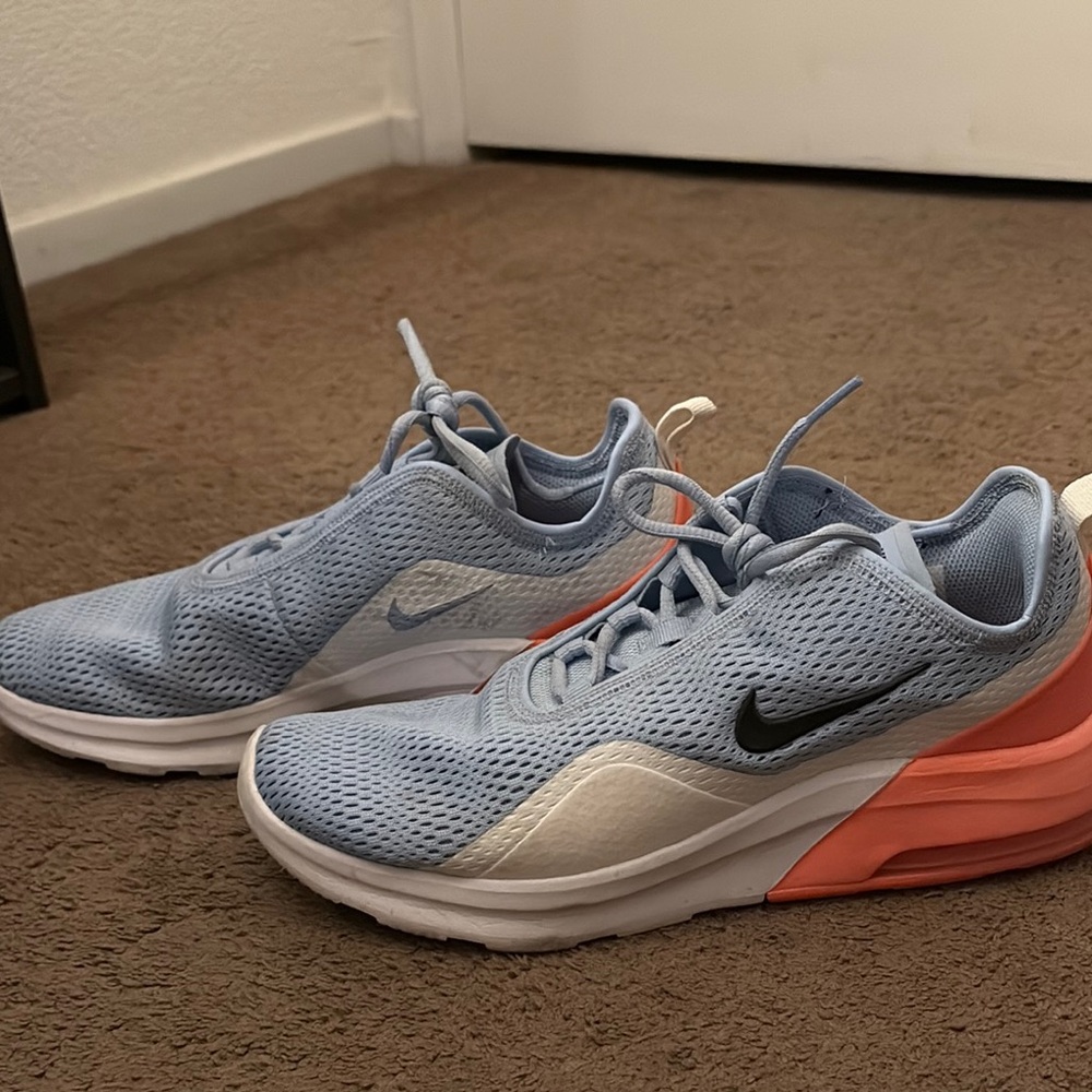 Nike Blue and Pink Sneakers with Mesh Upper and Cushioned Midsole